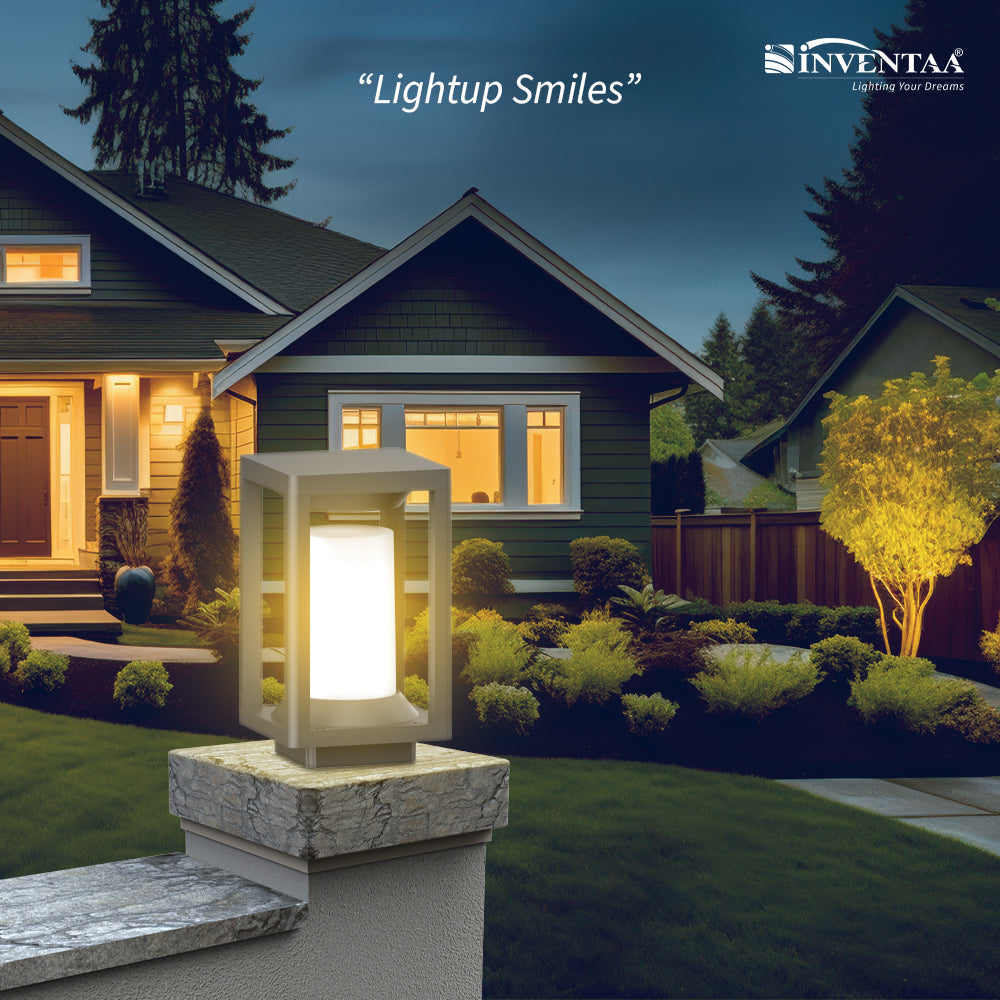 Modern gate wall light on stone pillar enhancing home exterior at night