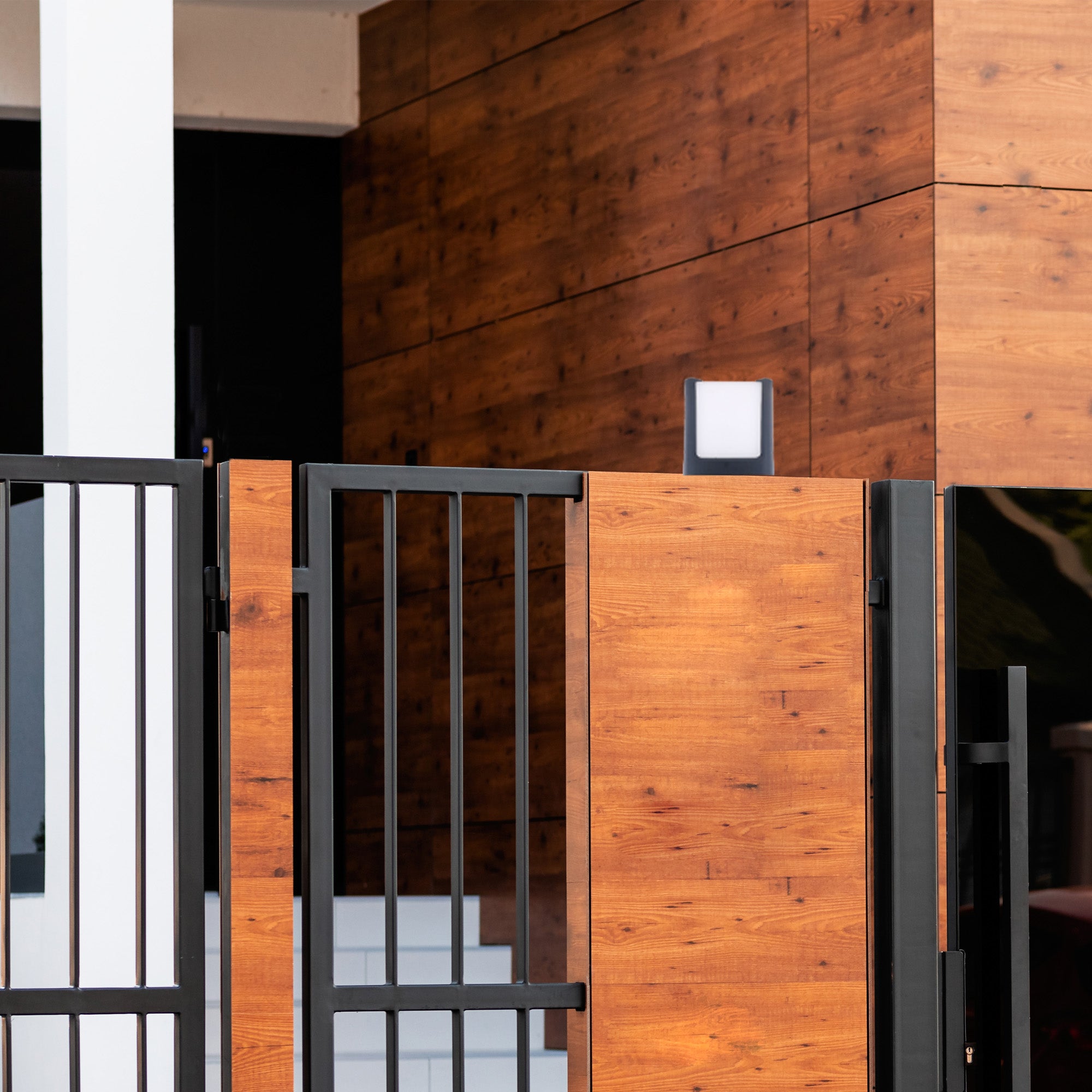 Modern dome light for gate enhancing wooden entry design with soft glow