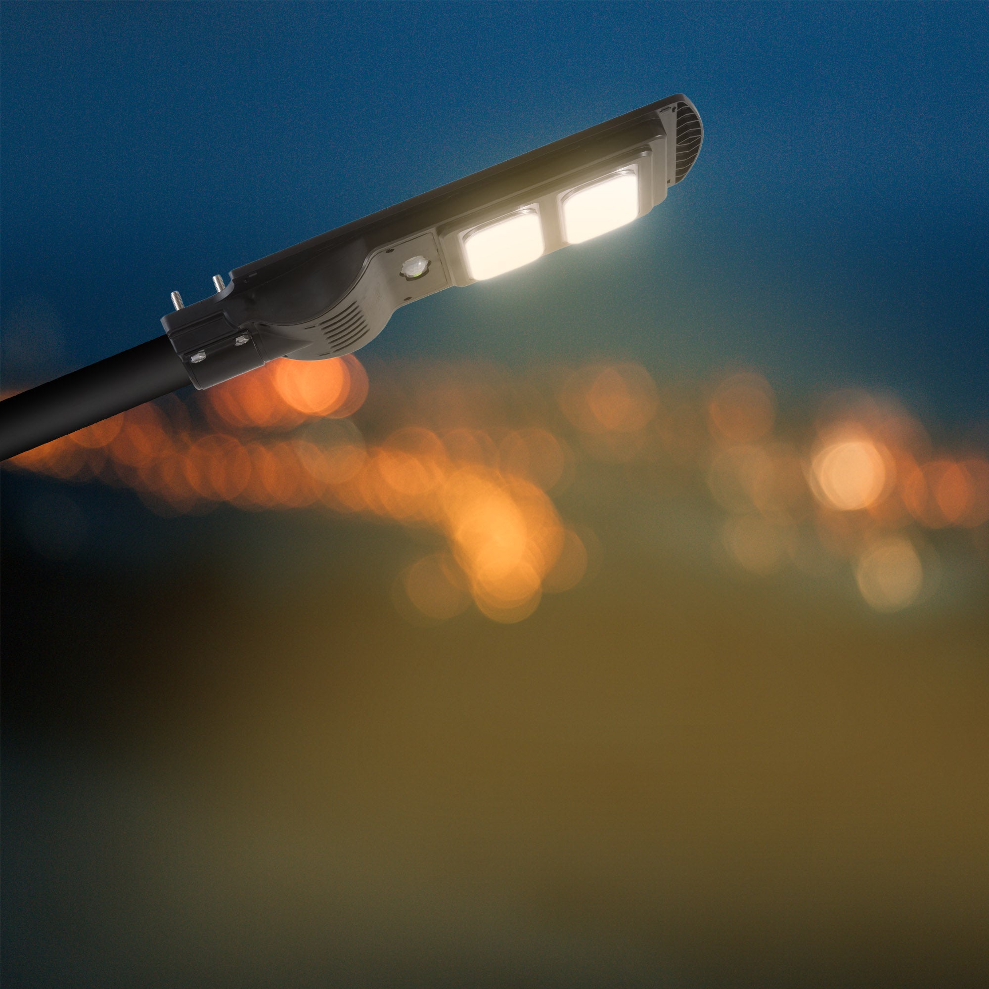 Erato 40W led solar street light emitting its warm white glow #power_40w
