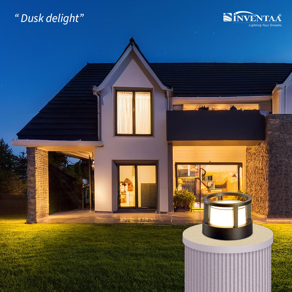 Elegant gate lamp design lighting modern home exterior at dusk