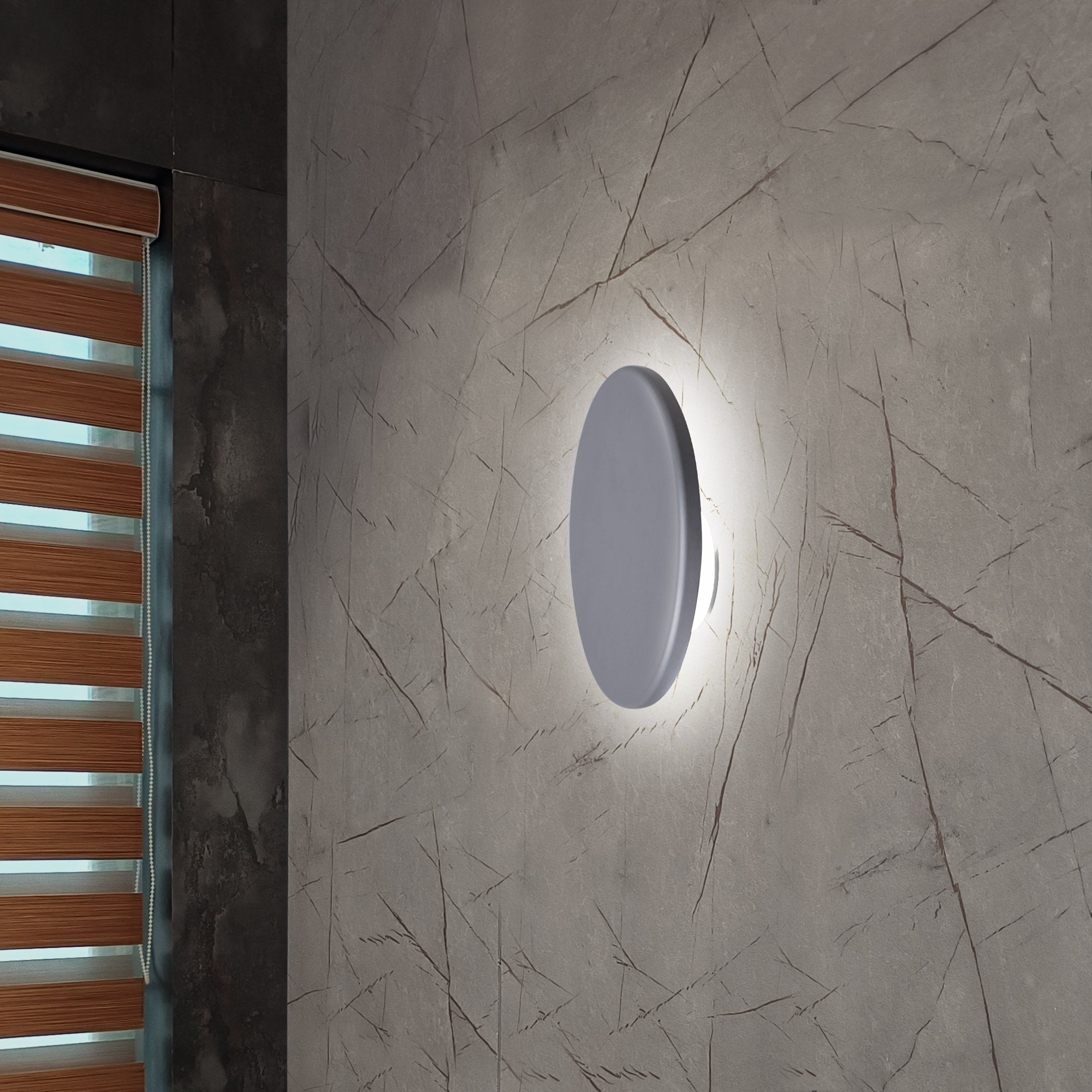 Romy led wall light emitting cool white glow