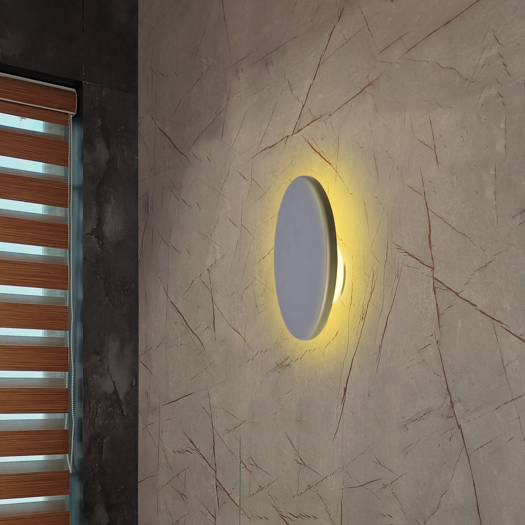 Romy led wall light emitting warm white glow